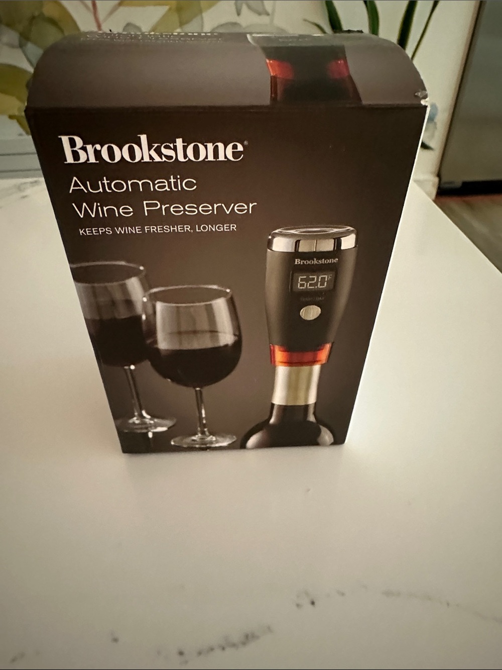 Brookstone Black Wine Preserver with Silver Top and Red Accent